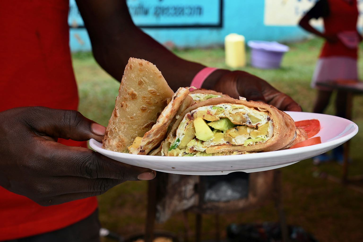Night-time Boda Boda Street Food Tour — Rolex Wraps & Muchomo